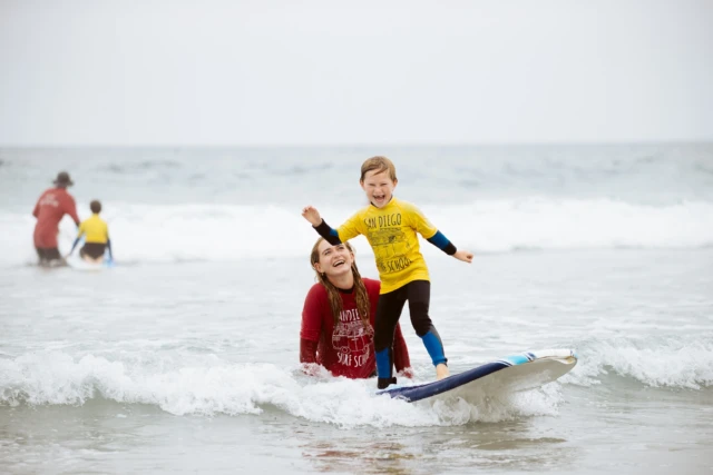 There's nothing more exciting than helping kids catch their first wave! 🌊 The smile says it all. 😁🏄‍♂️ Whether it's a private lesson, semi-private, or group session, we're here to make every moment unforgettable. 🌟 For a limited time, use code LESSON30 to get 30% off all lessons! 🙌 #FirstWave #SurfingWithKids #SanDiegoSurfSchool #SurfLesson #CatchTheWave

🌐 Website: www.sandiegosurfingschool.com
.
☎️ PB Office: (858) 205-7683
☎️ OB Office: (619) 987-0115
.
#SanDiegoSurfSchool
.
.
.
.
.
#SDSSfamily #SanDiego #PacificBeach #OceanBeach
#SoCal #WestCoast #SurfLessons #SummerCamp
#SurfClass #Summer #MissionBeach #SDSurfTribe
#SurfOfTheDay #SummerVibes #CaliforniaLifestyle
#SanDiegoSurf #SurfCoach #SDsurf #SanDiegoLiving
#SoCalLiving #SDLiving #SurfIsLife #surfvibes #surf